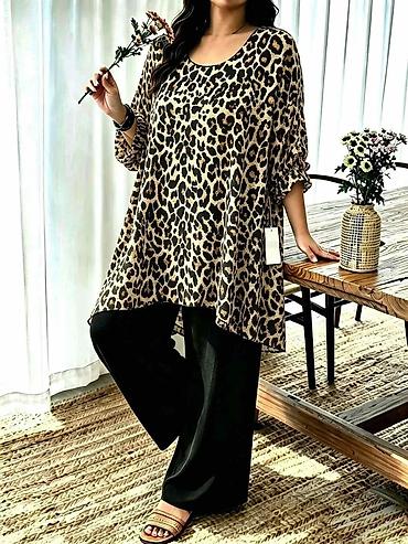 kompleti zenski zara: Tunike za punije
Cena 2100
Vel. Do 5xl
V15 — 1
