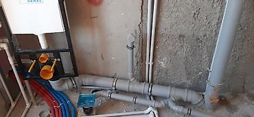 İstilik sistemi: Kombi sisteminin cekilmesi.kanalzasiya sistemleri.Divar ici unitaz ve — 12