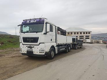 tatra 815: Yükdaşıma xidməti – bortlu kranmaşın və qoşqu - Avtomobil: MAN TGA — 3