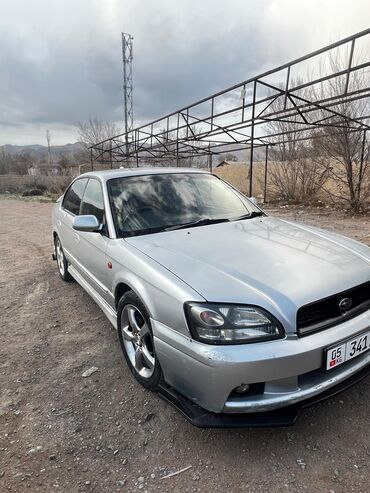 хундай грандеу: Автомобиль Subaru Legacy серебристого цвета. Оснащен спортивным