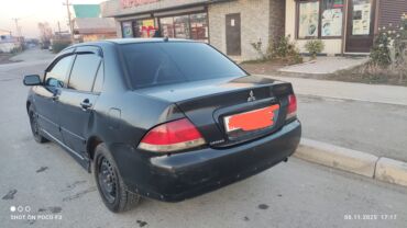 Mitsubishi: Mitsubishi Lancer: 2006 г., 1.6 л, Автомат, Бензин, Седан — 5