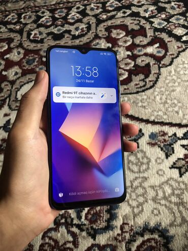 Xiaomi: Xiaomi Redmi 9T, 64 GB, rəng - Göy, 
 Sensor, Barmaq izi, Simsiz şarj