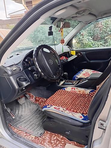 полный комплектация: Mercedes-Benz ML (W163) — интерьер и оснащение - Салон из черной — 2