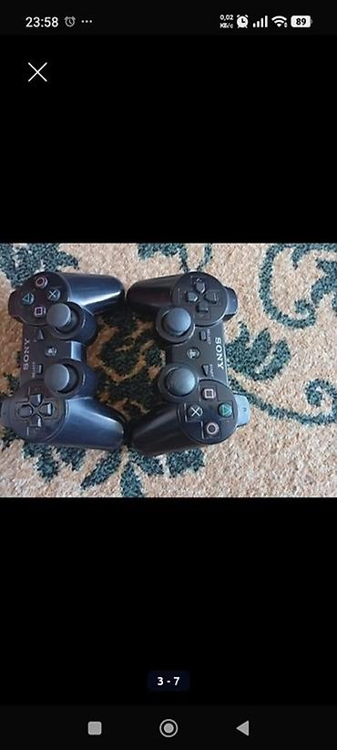 рии: Игровая приставка Sony PlayStation 3 Super Slim с двумя беспроводными — 7