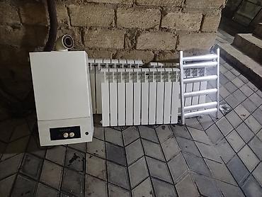 qızdırıcı kondisioner: Kombi satılır radyatorla birlikdə kanpirik dəsti hamısı birlikdə — 1