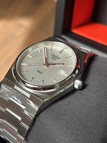 Tissot PRX — швейцарские кварцевые часы с интегрированным стальным