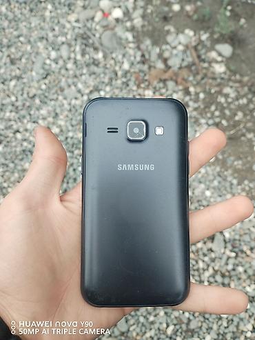 007 first light: Samsung Galaxy J1 Duos, rəng - Qara, İki sim kartlı — 1