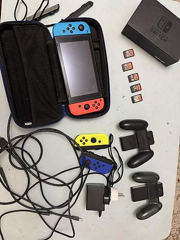 Nintendo Switch — комплект для игры дома и в дороге. В наборе: -