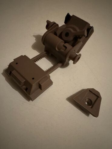 игровой мышка: Кронштейн-держатель (крепёжный узе для пнв ) из пластика, выполненный