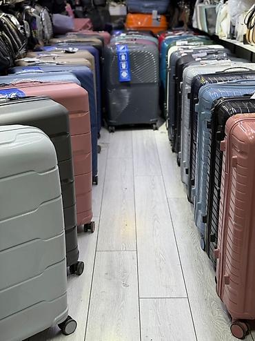 Чемоданы: Чемодан, Новый, Большой (более 70 л), Вращающиеся колеса на 360°, Кодовый замок, На колесах — 22