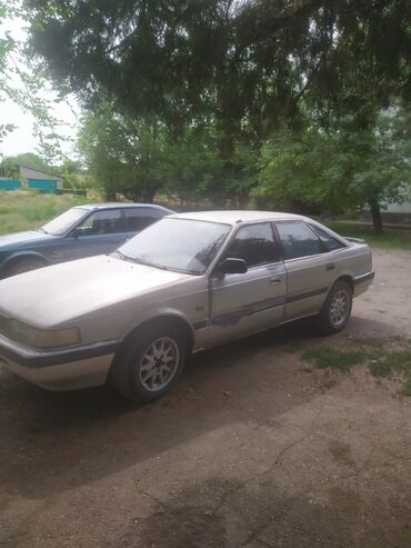 крыло сди: Mazda 626: 1988 г., 2 л, Механика, Бензин, Хэтчбэк