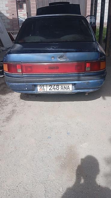 Mazda: Mazda 323: 1994 г., Механика, Бензин — 10