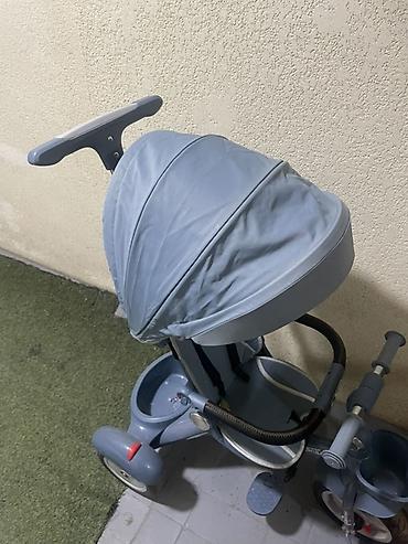 Детский трехколесный велосипед с родительской ручкой и капюшоном