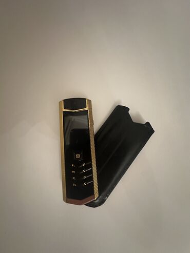 telefon qutusu: Vertu Aster, 64 GB, rəng - Qızılı, Düyməli