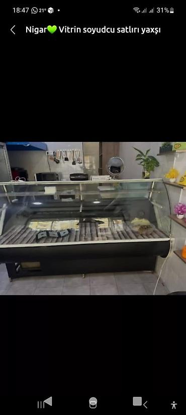 Vitrin soyuducu tecili cixilmalidi yaxsi veziyetde olcu 2 m di hec bir