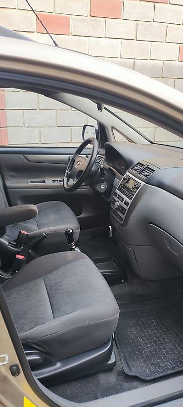 byd e2 2024: Toyota Avensis Verso: 2003 г., 0.2 л, Механика, Дизель, Минивэн — 5