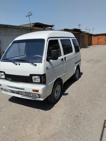 пониженный: Белый минивэн Daihatsu Hijet4вд передний мост отключается 1989 года