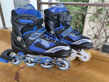 боксерские перчатки новые: İnline konki (roller skates) – tənzimlənən ölçülü, mavi-qara rəngdə