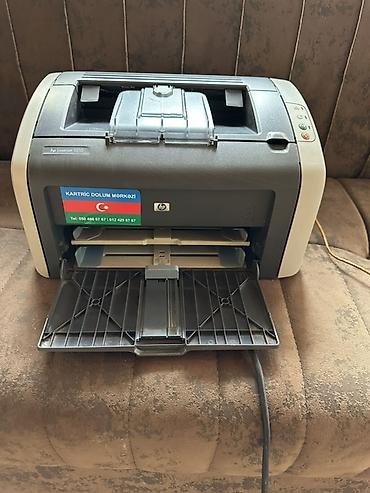 termal printer: HP LaserJet 1010 mono lazer printer Tam islek veziyetdedir - Model — 1