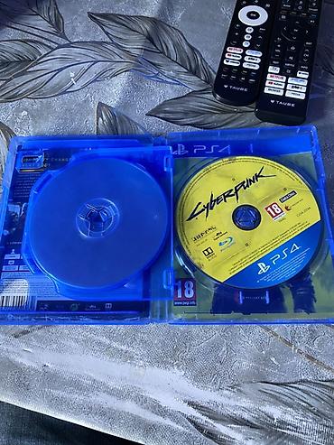 Məhsul: PS4 üçün Cyberpunk 2077 (Blu‑ray disk, rəsmi qutu və örtük)