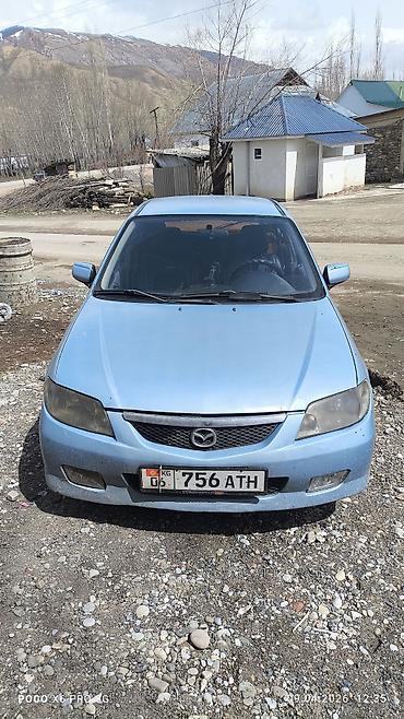 Mazda 323: 2002 г., 1.6 л, Механика, Бензин, Универсал