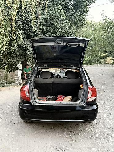 devo tiko: Kia Rio: 2003 г., 1.5 л, Автомат, Бензин, Хэтчбэк — 6