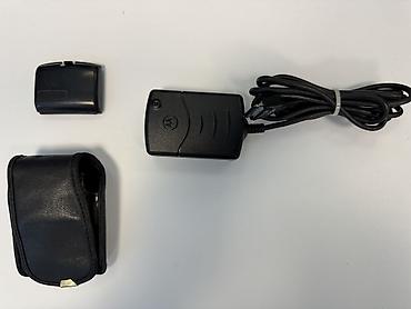 ericsson t28: Motorola StarTAC mobil telefonun kabrosu, batareyası, adapterı və — 2