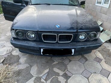 полик 5 д: Передний Бампер BMW 1995 г., Б/у, цвет - Черный, Оригинал