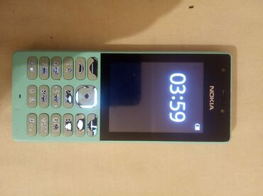 телефон кнопочные: Nokia 6700 Slide, Б/у, цвет - Голубой, 2 SIM