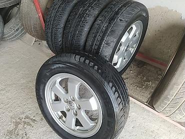 islenmis teker satisi: 4 ədəd yığılmış disk+şin komplekti əla vəziyyətdədiler pirus diskidi — 7