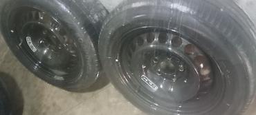 qezali avtomobil: Satılır: 4 ədəd 16Disk teker tekerler 5. 6Ay geder 215.55.16 — 5