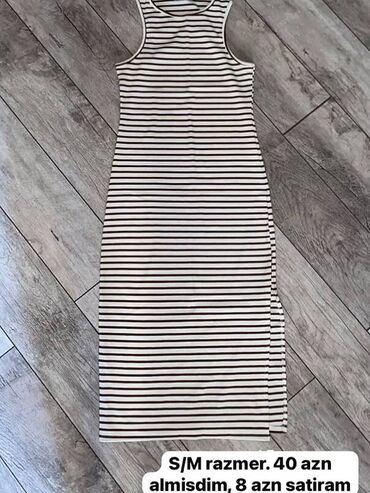 Kombinezonlar: - Qara kombinezon: S/M razmer (M olsa da uyğun). Ön hissədə iki cüt — 4