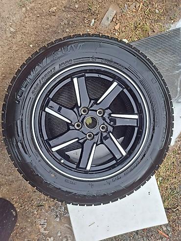 Шины и диски: Комплект зимних колес для кроссоверов/SUV. Состав: - Шины Goodyear — 2