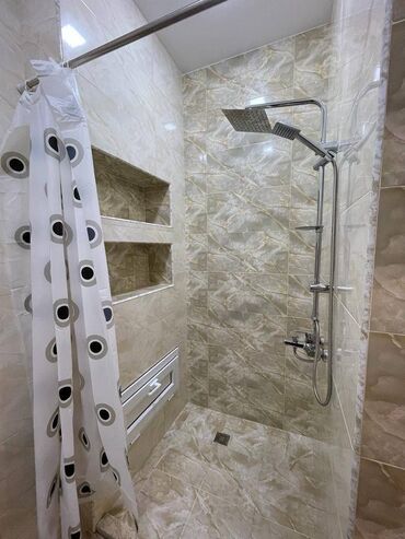 Uzunmüddətli kirayə mənzillər: Elit ticarət mərkəzi Yuxa Restoranının arxasında 16 mərtəbəli binanın — 10