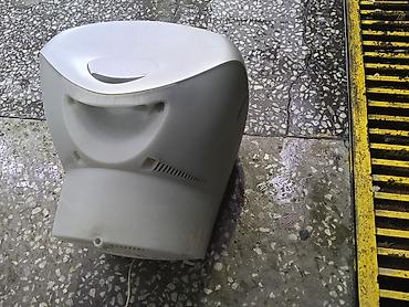 Televizorlar: Philips CRT televizor - Ekran: təxminən 14–15 düymlük əyri CRT ekran — 4
