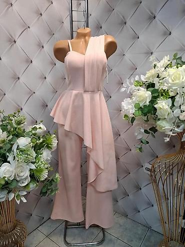 sat versace: Elegantni ženski kombinezon u puder‑roze boji - Model sa širokim — 1