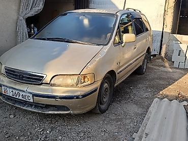Honda Odyssey: 1999 г., 2.3 л, Автомат, Бензин, Минивэн