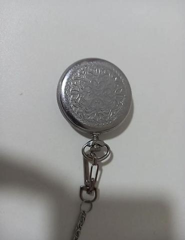saad: Məhsul: Mexaniki cib saatı (zəncirli, qapaqlı) Təsvir: - Korpus — 2