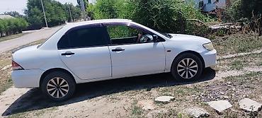 27 5: Mitsubishi Lancer: 2000 г., 1.5 л, Вариатор, Бензин, Седан — 3