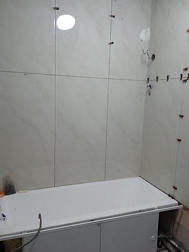 Укладка плитки: Облицовка ванной комнаты крупноформатной керамической плиткой - Стены — 4