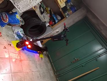 elektrik skutur: İşlənmiş Elektrik samokat ≤ 5", 351 - 500 Vt, > 45 km/s, Ünvandan götürmə — 9