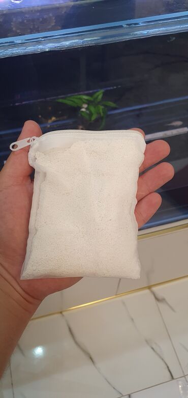 Akvarium aksessuar və ləvazimatları: Ağ rəngli silindrik korpusa malik akvarium xarici filtri. Qablaşdırma — 15