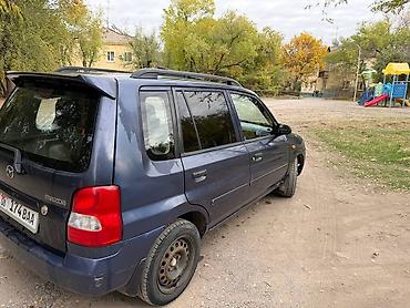 ann chery: Mazda Demio: 2001 г., 1.5 л, Механика, Бензин — 5