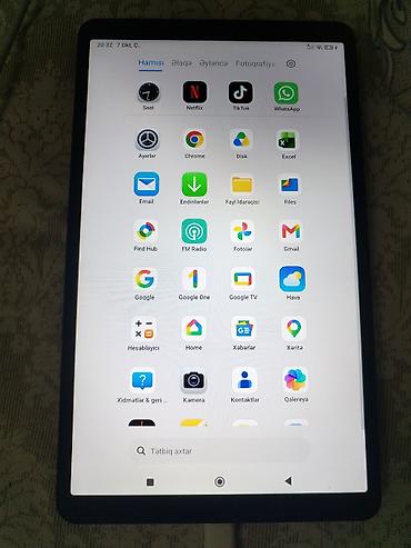tab s10: Redmi planşet - Model: Redmi (arxa qapaqda loqo və informasiya — 2