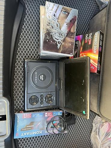 dvd video player: Портативный DVD-плеер EVD + комплект дисков и ТВ-приставка Состав — 1
