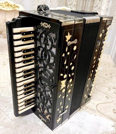 fender gitara simleri: Qarmon