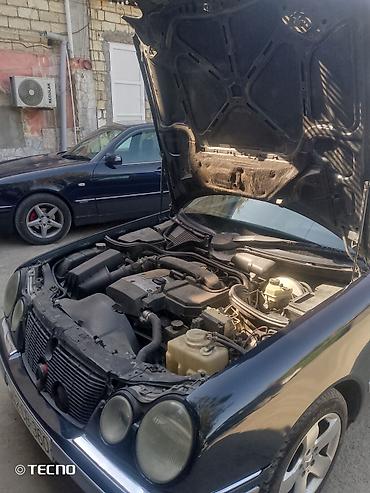 Mercedes-Benz: Mercedes-Benz E-Class: 2.3 l | 1995 il Sedan — 14