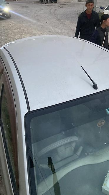 1 кд: Nissan March: 2004 г., Автомат, Бензин, Хэтчбэк — 5