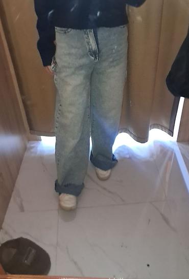 Geniş kəsimli cins şalvar - Rəng: Açıq mavi/solğun denim - Stil