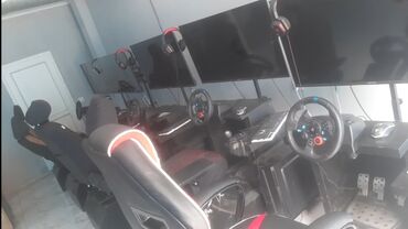 Video oyunlar üçün aksesuarlar: 2 ədəd yarış simulyatoru dəsti təklif olunur. Hər bir dəstdə steam